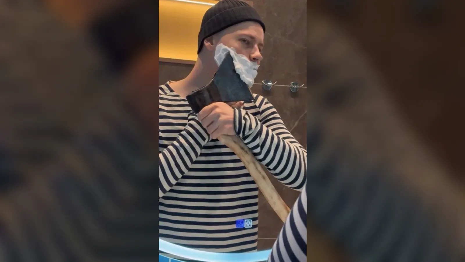 "I am a Russian man." SHAMAN shaved with an axe on camera